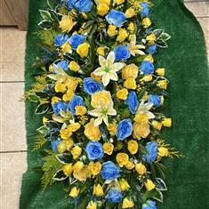 Blue and Yellow Casket Spray